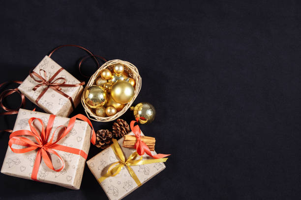 istock Festive Christmas boxes in dark background. 1086361722