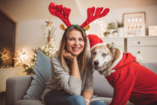 istock Christmas masking with dog 1086365520