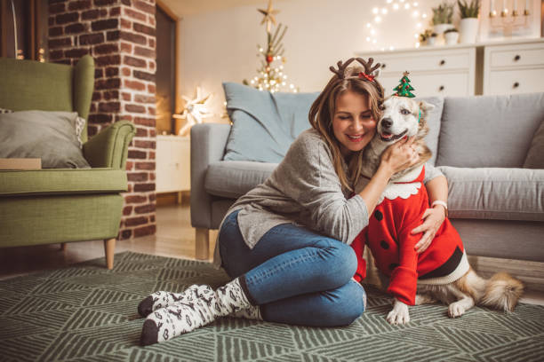 istock Christmas masking with dog 1086365526