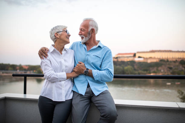 istock Senior couple enjoying their time spent on the balcony 1086367634