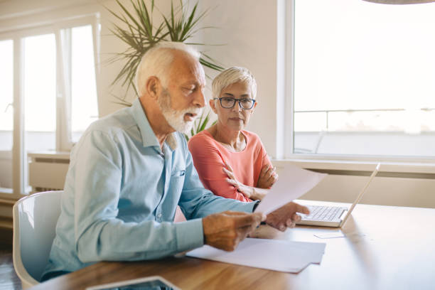 istock Senior couple managing their finances 1086367724