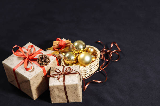 istock Festive Christmas boxes in dark background. 1086374494