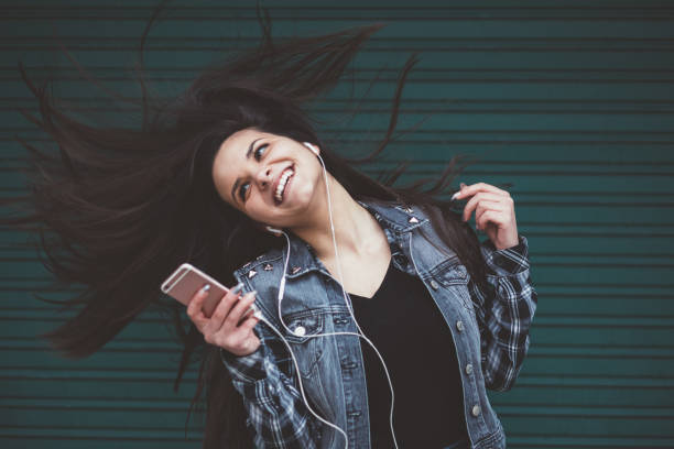 istock Happy girl dancing 1086374528