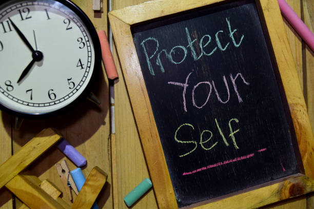 istock Protect yourself on phrase colorful handwritten on chalkboard 1086376534