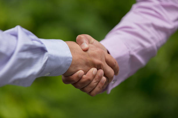 istock Business handshake outdoors 1086379128