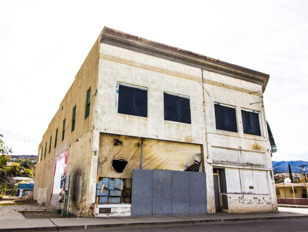 istock Abandoned Commercial Storefront Building With Boarded Up Windows 1086381074