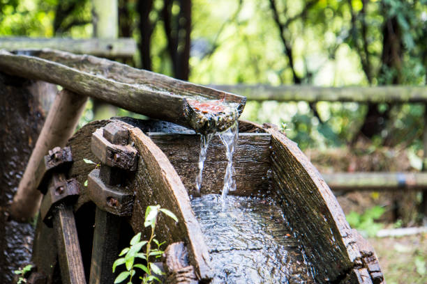 istock old wooden waterwheel in the forest 1086381392