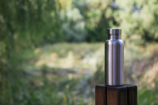 istock Insulated Stainless Steel Bottle in the forest 1086381414