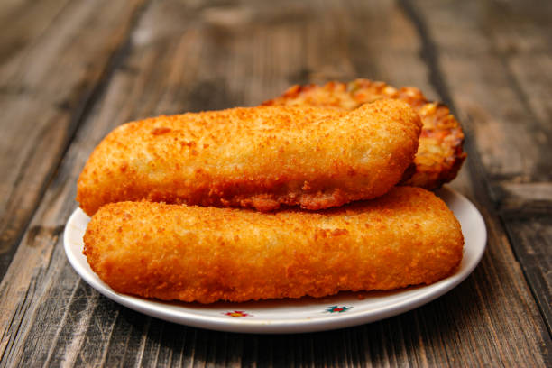 istock Crispy breaded fried fish fillet and vegetarian burger 1086381468