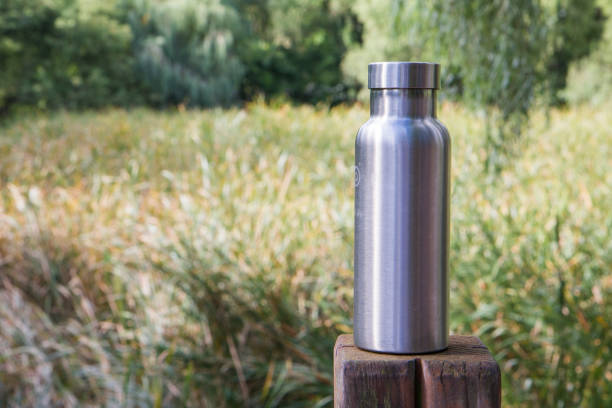 istock Insulated Stainless Steel Bottle in the forest 1086381584
