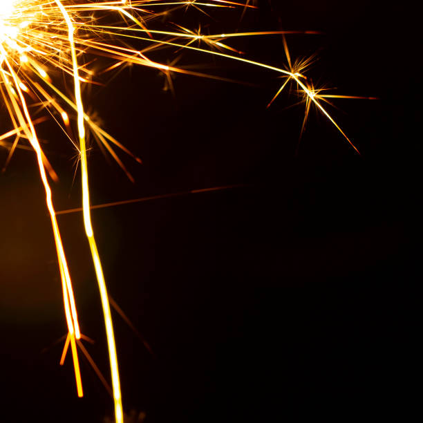 istock Christmas sparkler isolated on black background. Bengal fire 1086381600