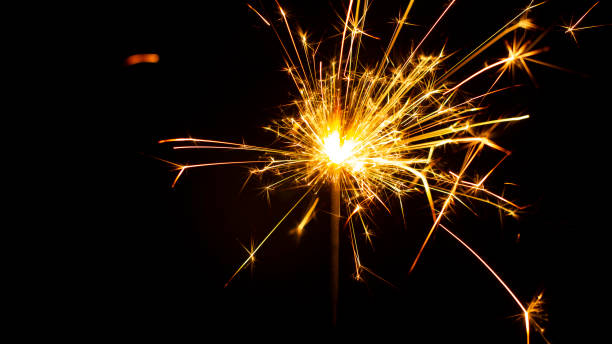 istock Christmas sparkler isolated on black background. Bengal fire 1086381638