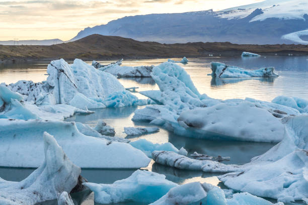 istock Icebergs in glacier lagoon Jokulsarlon before sunset, Iceland 1086386512