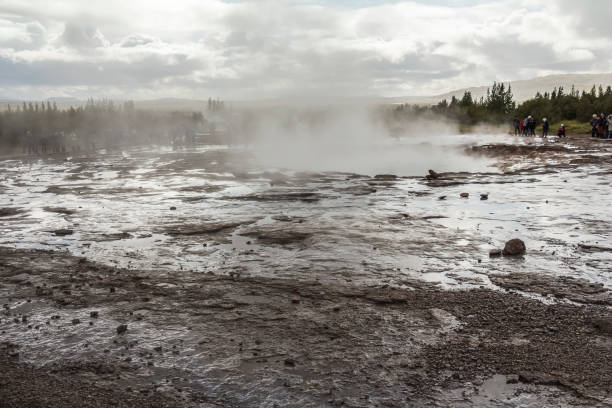 istock Steam on Geysir Strokkur before eruption in Iceland 1086395606