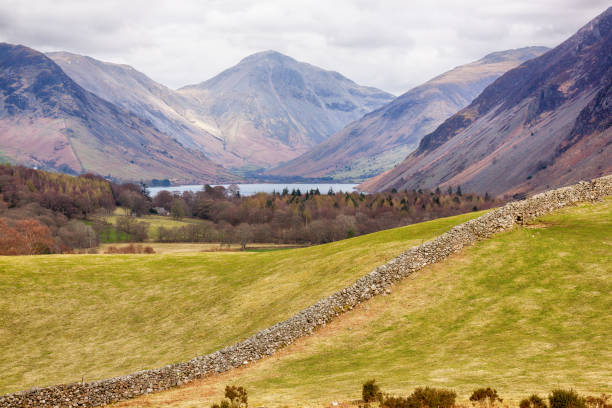 istock Dry Stone Wall with trees and Mountains 1086400842