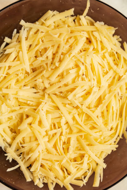 istock Hard cheese chopped on a plate on the table 1086404614