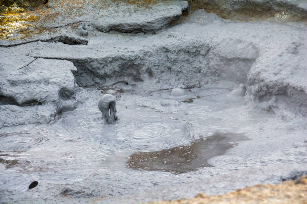 Geothermic activity in mud pools of Hverir, Iceland Geothermic activity in mud pools of Hverir in Iceland sulphur landscape fumarole heat stock pictures, royalty-free photos & images