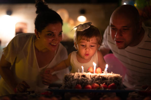 Child Celebrating Her Birthday Party at Home