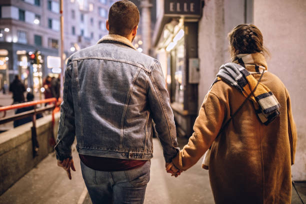 istock Rear View On Couple In City 1086412020