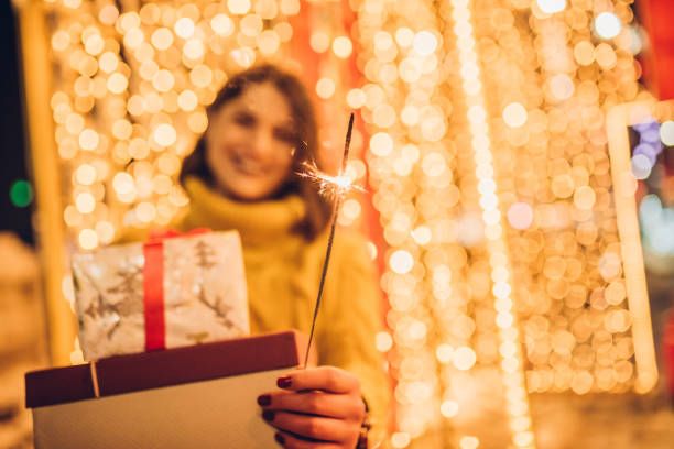istock Woman holding gifts 1086412432