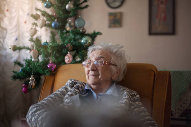 istock Smiling old woman at home. 1086419454