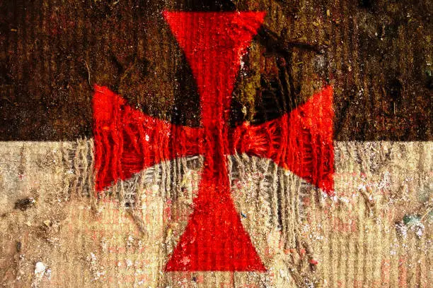 Knights of Templar old flag on grunge textile fabric with displace