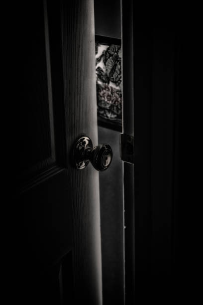 istock Dark Spooky Cracked Open Backlit Door 1086426484