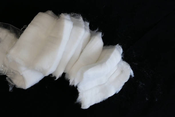 istock cotton on a black background,medical cotton, 1086427256