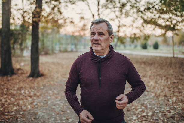 istock Elderly man running in park 1086429692