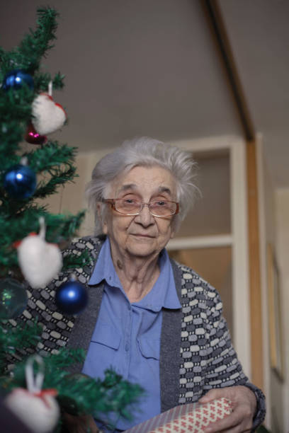 istock Female pensioner on christmas. 1086433386