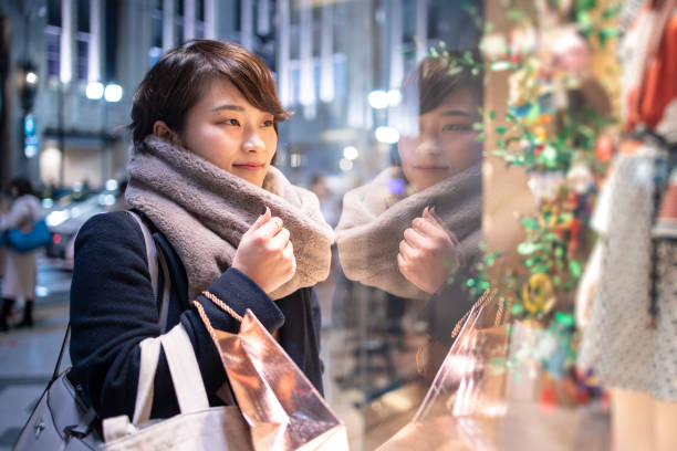 istock Young woman shopping after work 1086438064