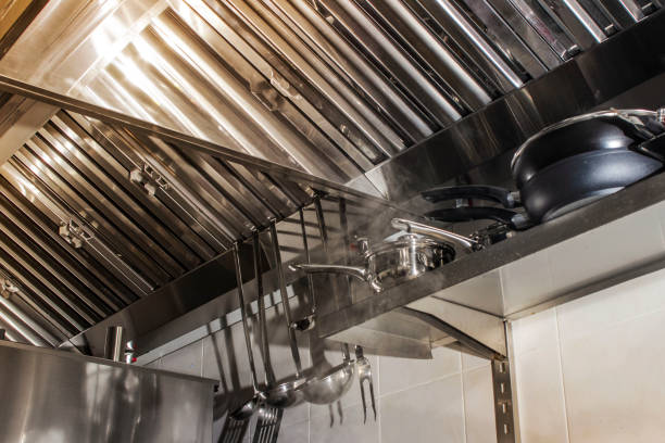 istock Exhaust systems, hood filters detail in a professional kitchen 1086439672