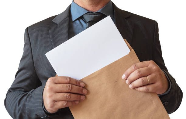 istock Business man opens envelope with blank sheet, on white background. 1086441404