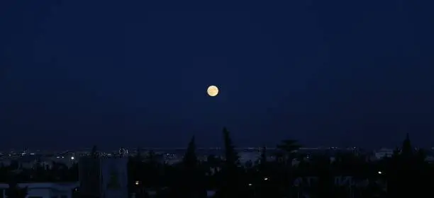 The moon shines in the capital of Tunisia