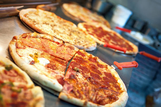 istock Slice of pizza quattro stagioni on scapula 1086447292