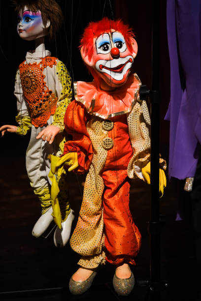 istock Beautiful clown puppets for display and home decoration 1086479876