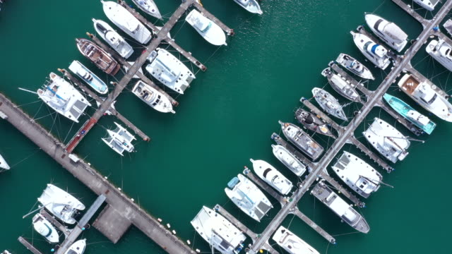 Cruisers lining in small harbor
