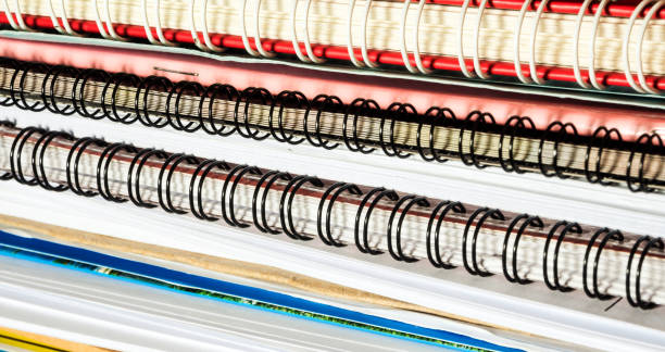 istock Stacked of office documents paper in the black background 1086490522