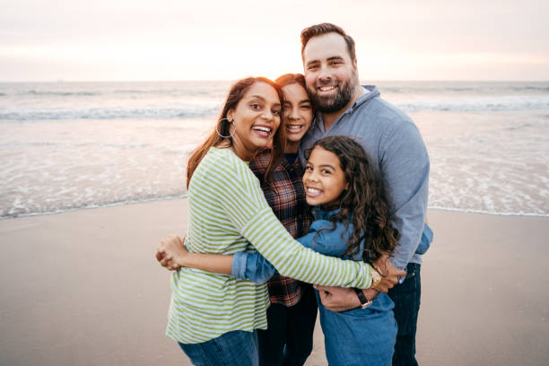 istock Sunset at the beach with family 1086492016