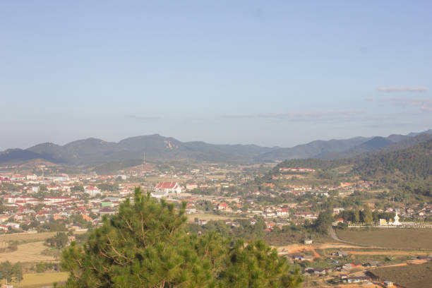 istock city landscape with mountain and blue sky background 1086509180