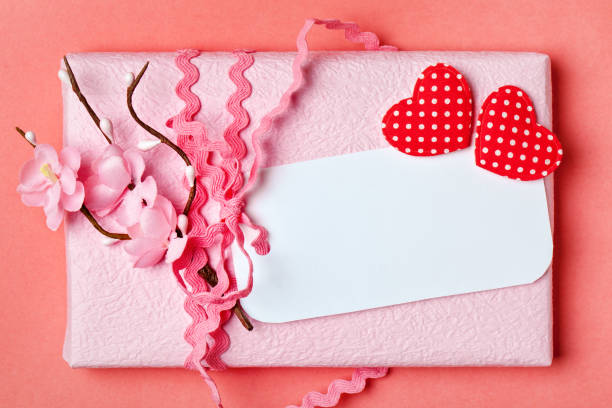 istock Greeting card on coral background. Selective focus. Horizontal. Background with copy space. 1086518292