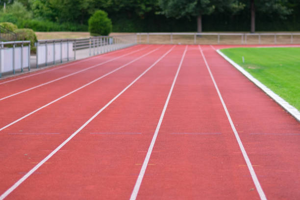 istock Receding view of an empty race track 1086524524