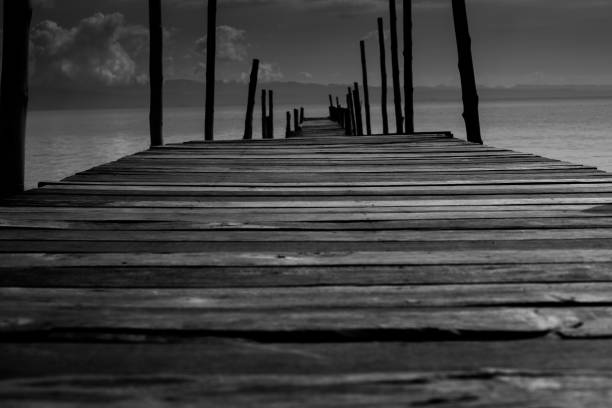 istock Black White Monochrome old wooden bridge 1086529190