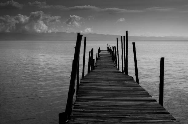 istock Black White Monochrome old wooden bridge 1086529236