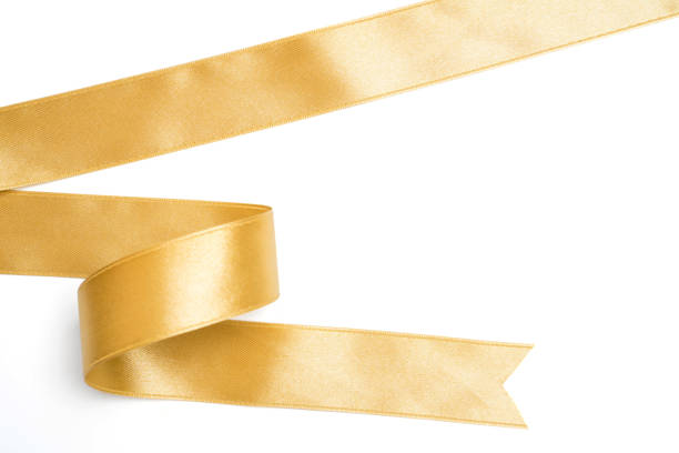 istock Gold ribbon in roll on white background 1086537006