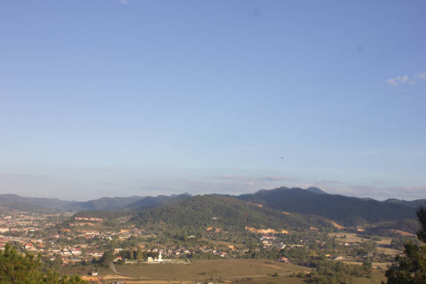 istock city landscape with mountain and blue sky background 1086537022