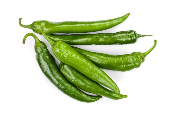 istock green hot chili peppers isolated on white background. Top view. Flat lay pattern 1086537126