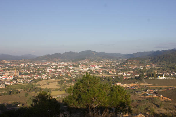 istock city landscape with mountain and blue sky background 1086539528