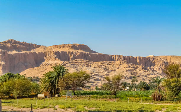 istock Ancient Egyptian temple Amon Ra in Luxor with columns and beautiful bas-reliefs Pharaoh's cult 1086539954