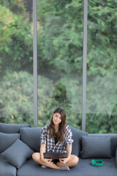 istock Woman relaxing in living room. 1086542106